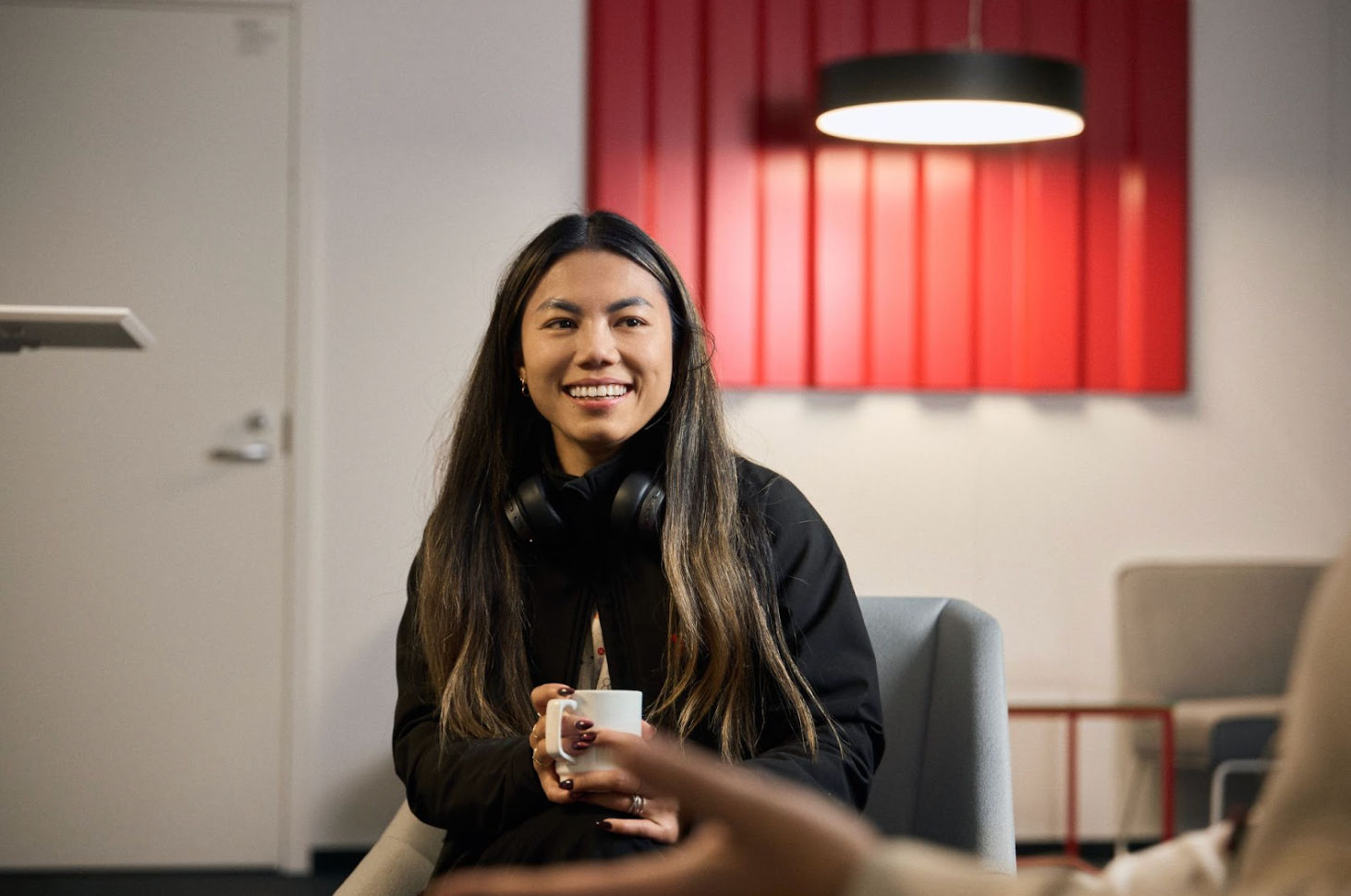 Kalmar's employer having coffee at the office